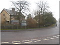 Road signs at the junction of The Strip and Netherhampton Road