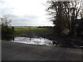 TM4576 : Field entrance off the A1095 Halesworth Road by Geographer