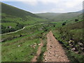 Lower end of track ascending above the valley of the Afon Sawdde