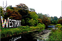 L9884 : Westport House Grounds - WESTPORT sign along Carrowbeg River by Joseph Mischyshyn