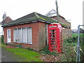 Derelict shop and red telephone box, Hernhill
