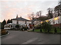 Sun setting behind the Plas Hafod Hotel, Gwernymynydd