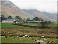 Looking across grassland towards Burns Farm