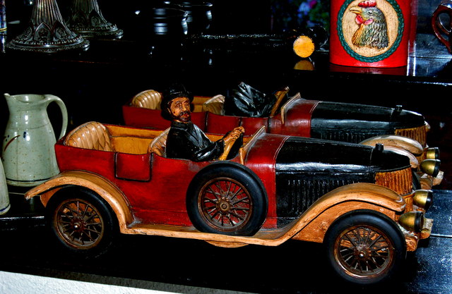 Moycullen - Handcraft Shop - Two Old Model Cars, one with Driver