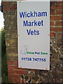 TM3055 : Wickham Market Vets sign by Geographer