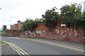 East Field Street wall at entrance to railway footbridge