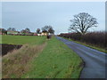 TF1804 : Gunthorpe Road crossing Newborough Fen by Richard Humphrey