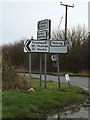 TL2462 : Roadsigns on High Street by Geographer