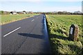 Milestone beside the B4211