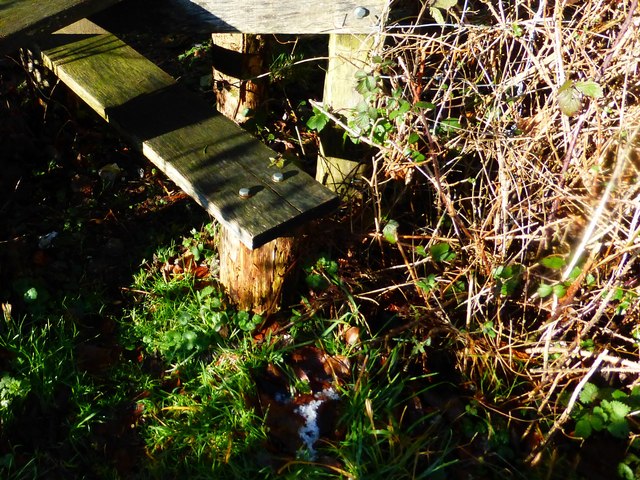 Bottom of stile with partially melted hailstones