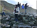 C9444 : Tourists, Giant's Causeway by Kenneth  Allen