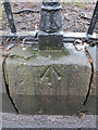 Rivet bench mark near the junction of Seeds Lane and Long Moor Lane