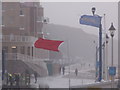 Boscombe: flags fly stiffly on the prom