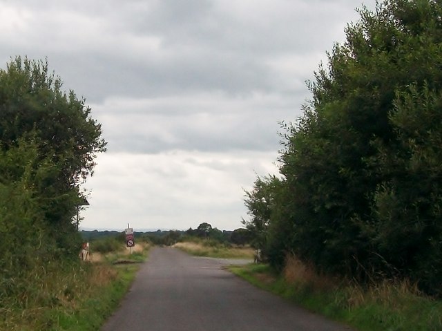 Approaching a Bord na Móna railway crossing on the minor road linking the R444 and the Belmont road