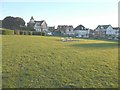 Four large houses across the green