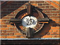 Inscribed stone in pediment of building in Friars Street, CO10