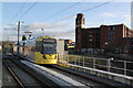 Tram leaving Freehold towards Manchester