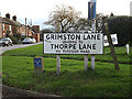 TM2737 : Grimston Lane sign by Geographer