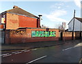ST2986 : Green Maesglas name on a wall in Newport by Jaggery