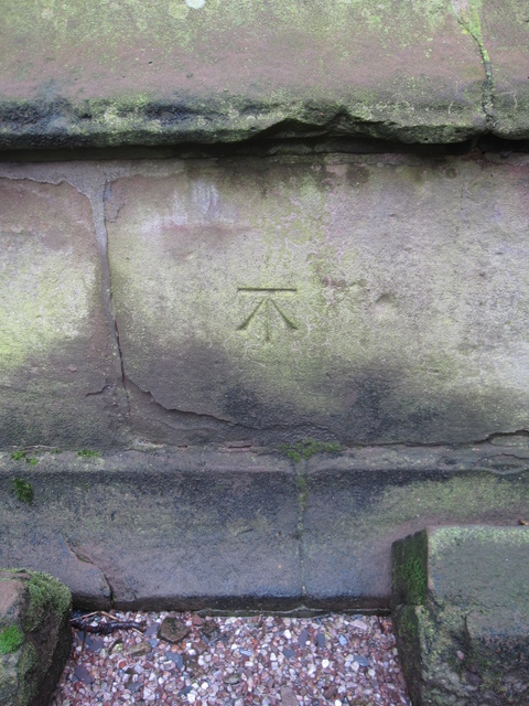 Bench mark on St Peter's church tower, Waverton
