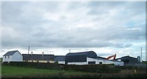 H7401 : Farmhouse and buildings at the T-junction in Closnabraddan TD by Eric Jones