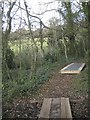 Bridging the muddy bits in Frobisher Wood, Frobisher Close, Teignmouth