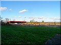 Large barn and farmland to rear of St Botolph