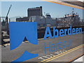 Aberdeen: reflections in the Harbour Office sign