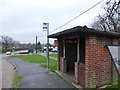 Bus stop between the church and public house in Wood Street