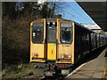 British Rail Class 313 Electric Multiple Unit 313060 waits at New Barnet Station heading for Welwyn Garden City