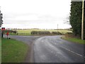 NU1230 : Road junction in Bellshill by Graham Robson