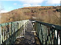 Across a river footbridge in Penrhiwceiber