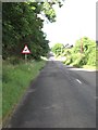 The B180 (Hilltown Road) running alongside the boundary wall of Tollymore Forest Park