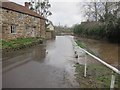 The Winford Brook overflows into The Batch- a back road in Chew Magna