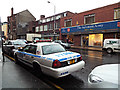 New York Police Department car on Dumbarton Road