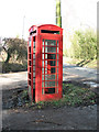 Smashed up K6 telephone box