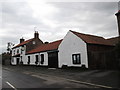 SE5346 : The Three Hares pub in Bilbrough by John Slater