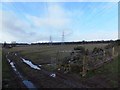 NH5444 : Power lines and pylons, Cononbank Farm by Alpin Stewart