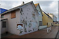 Battered seafront houses, Torcross