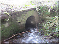 Culvert taking Nant Mair beneath minor road