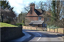 SU9347 : Looking past the church to Home Farmhouse, Puttenham by David Martin
