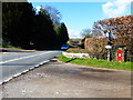 Post box at southern end of lane by junction with the A272