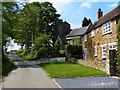 Cottage and St Mary