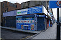 TQ3881 : Poplar Convenience Store, East India Dock Road by Ian S
