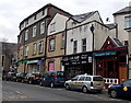 S.M.Ash shop and a row of taxis in Abertillery