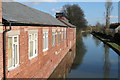 SK5978 : Chesterfield Canal and the workshopos by Dave Pickersgill