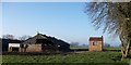 Farm buildings and factory gatehouse at Peaton Hall