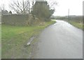 Tumbledown building beside the road