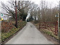 SN7400 : Road and public footpath near the Dyffryn Arms, Bryncoch by Jaggery