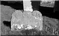 TM2984 : St George's church - old headstone in churchyard by Evelyn Simak
